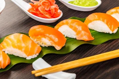 Sushi with salmon on a leaf Stock Photos