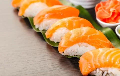Sushi with salmon on a leaf Stock Photos