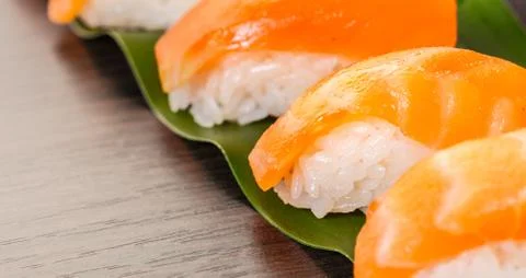 Sushi with salmon on a leaf Stock Photos