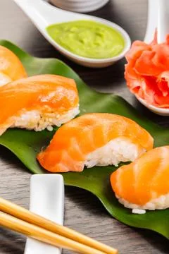 Sushi with salmon on a leaf Stock Photos