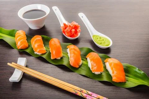 Sushi with salmon on a leaf Stock Photos