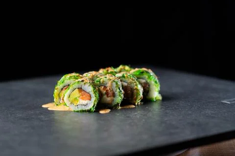 Sushi with salmon on a stand Foto stock