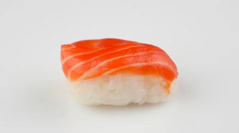 Sushi with salmon on white background rotating (loop) Stock Footage 55640334