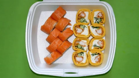 Sushi set on green background. Clouse up. Stock Footage 122397813