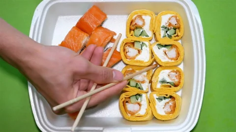 Sushi set on green background. Clouse up. Stock Footage 122397974