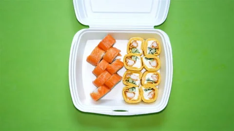 Sushi set on green background. Stock Footage 122398512