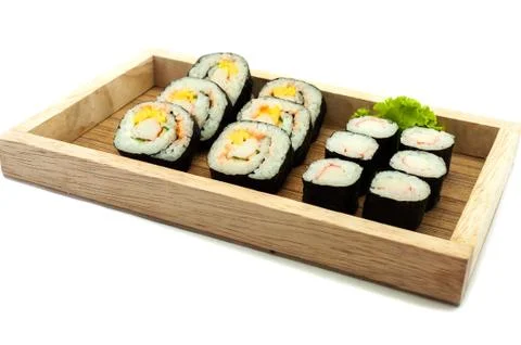 Sushi set in a kitchen board Stock Photos