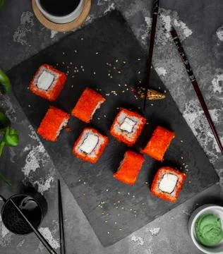 Sushi set with red caviar on the table top view Stock Photos