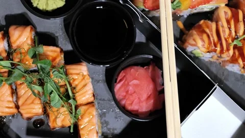 Sushi set rolls, maki in packging tray. Japanese and Asian food. Stock Footage 165272428