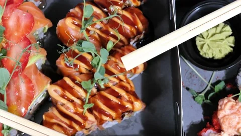 Sushi set rolls, maki in packging tray. Japanese and Asian food. Stock Footage 165272448