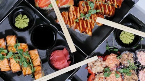 Sushi set rolls, maki in packging tray. Japanese and Asian food. Stock Footage 165272649