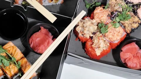 Sushi set rolls, maki in packging tray. Japanese and Asian food. Stock Footage 165272929