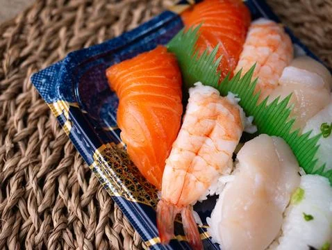 Sushi sets in plastic box trays for Delivery service. Stockfoto's