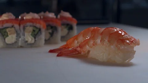 Sushi with shrimp are on the table. Stock Footage 127856147