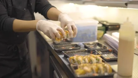 Sushi takeaways being packed Stock Footage 150965165