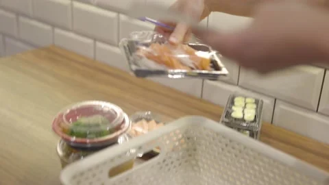Sushi takeaways being packed Stock Footage 150965282
