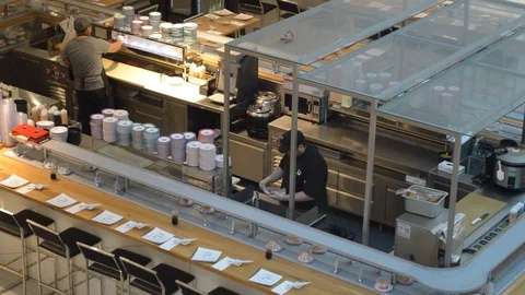 Sushi train was serving in the Japanese restaurant. Stock Footage 96296563