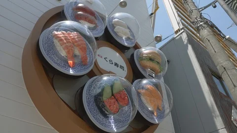 Sushi turning Stock Footage 119896757