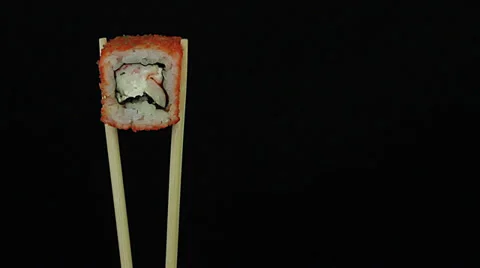 Sushi turns on a black background loop Stock Footage 34964196