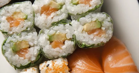 Sushis rotating close ups on black background 4K Stock Footage 260137809