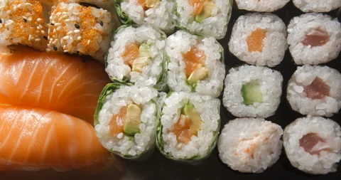 Sushis rotating close ups on black background 4K Stock Footage 260137843