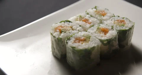 Sushis rotating close ups on black background 4K Stock Footage 260137907
