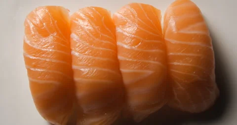 Sushis rotating close ups on black background 4K Stock Footage 260137973