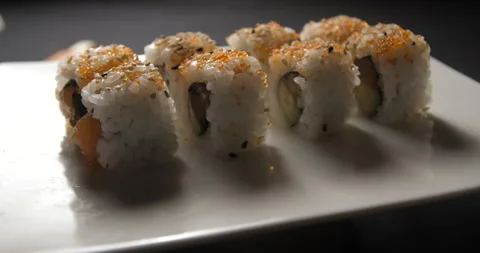 Sushis rotating close ups on black background 4K Video stock 260137996