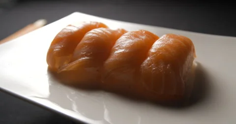 Sushis rotating close ups on black background 4K Video stock 260138059