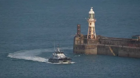 Suspected migrants arrive in Dover on board a Border Security Command vessel Stock Footage 341357582