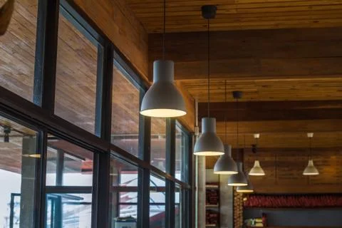 Suspended ceiling lamp sorted in a row, vintage style. Stock Photos