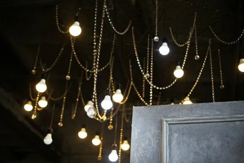 Suspended light bulbs 2 Stock Photos