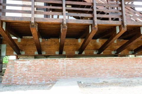 Suspended solid wood deck structure detail. Raised wooden deck and hand guard Stock Photos