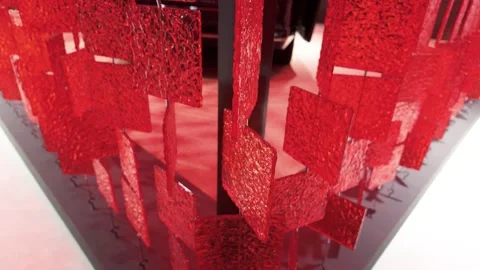 Suspended translucent red panels with textured surfaces 库存影片 337330487