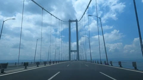 Suspense Bridge Blu Sky Driving Automobile Highway Stock Footage 244851333