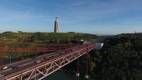 Suspension Bridge 25 De Abril Tagus River In Lisbon Portugal aerial shot Stock Footage