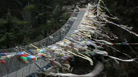 Suspension bridge and Himalayas Stock Footage 24657904