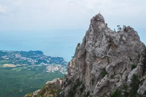 Suspension bridge connesting two mountain peaks. Stock Photos