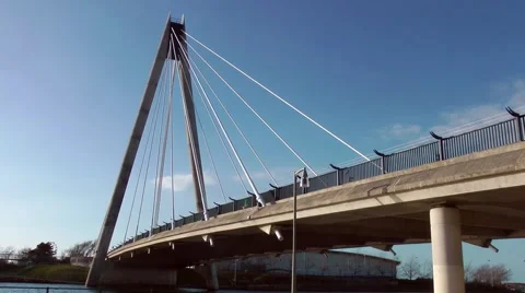 Suspension bridge deep blue sky diagonal concrete Stock Footage 48679859