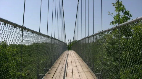 Suspension bridge gently sways in the wind (High Definition) Stock Footage 367729