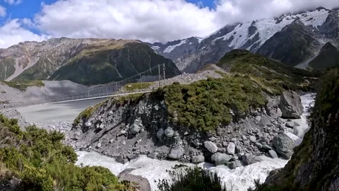 Suspension Bridge Over Hooker River in Mount Cook National Park  Alpine Hik.. Stock Footage 295010497