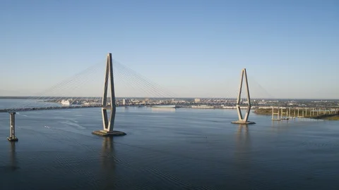 Suspension bridge over the river overlooking the city Stock Footage 96377100