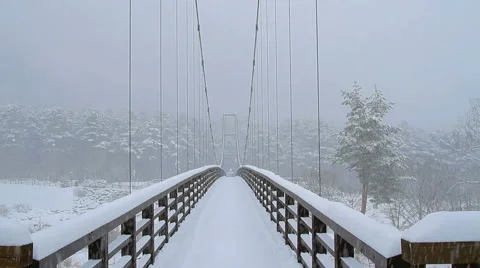 Suspension bridge in the winter. Stock Footage 40301477