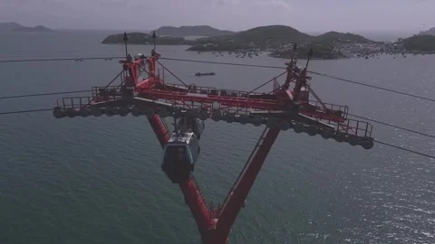 Suspension cable system over coastal landscape in sunny weather Stock Footage 308246617