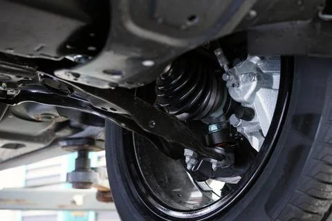 Suspension elements and CV joint boot of a modern car. Stock Photos