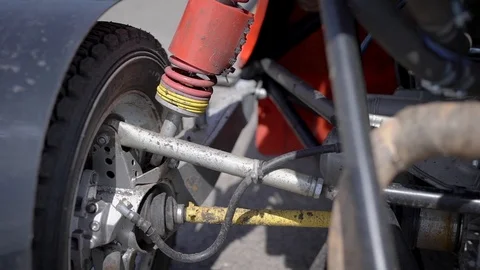 Suspension elements of a sports buggy. A complex multi-link suspension system Stock Footage 115101858