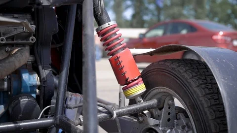 Suspension elements of a sports buggy. A complex multi-link suspension system Stock Footage 115101916