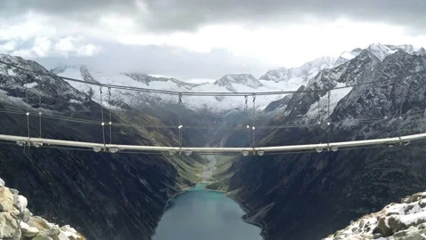 Suspension empty bridge on top of the mountain between the rocks Stock Footage 120702648