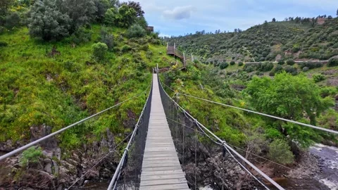 Suspension pedestrian bridge of Barca da Amieira, Portugal Stock Footage 277284430