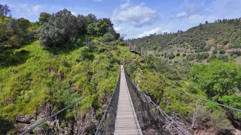 Suspension pedestrian bridge of Barca da Amieira, Portugal Stock Footage 278272804